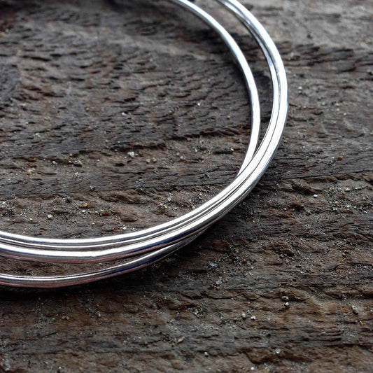 Triple bangle with heart charm